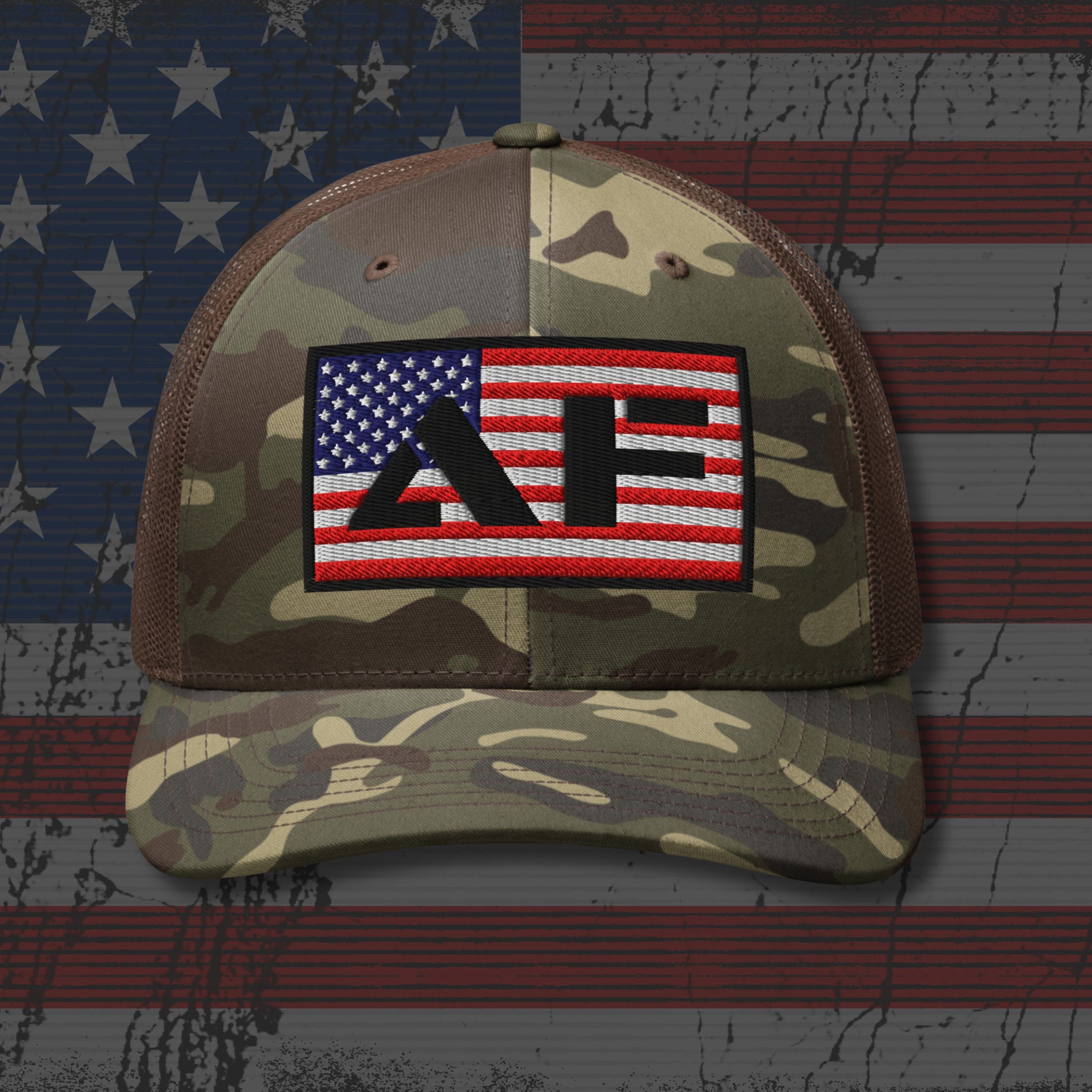 Camouflage cap with American flag and 'AF' patch on a distressed American flag background