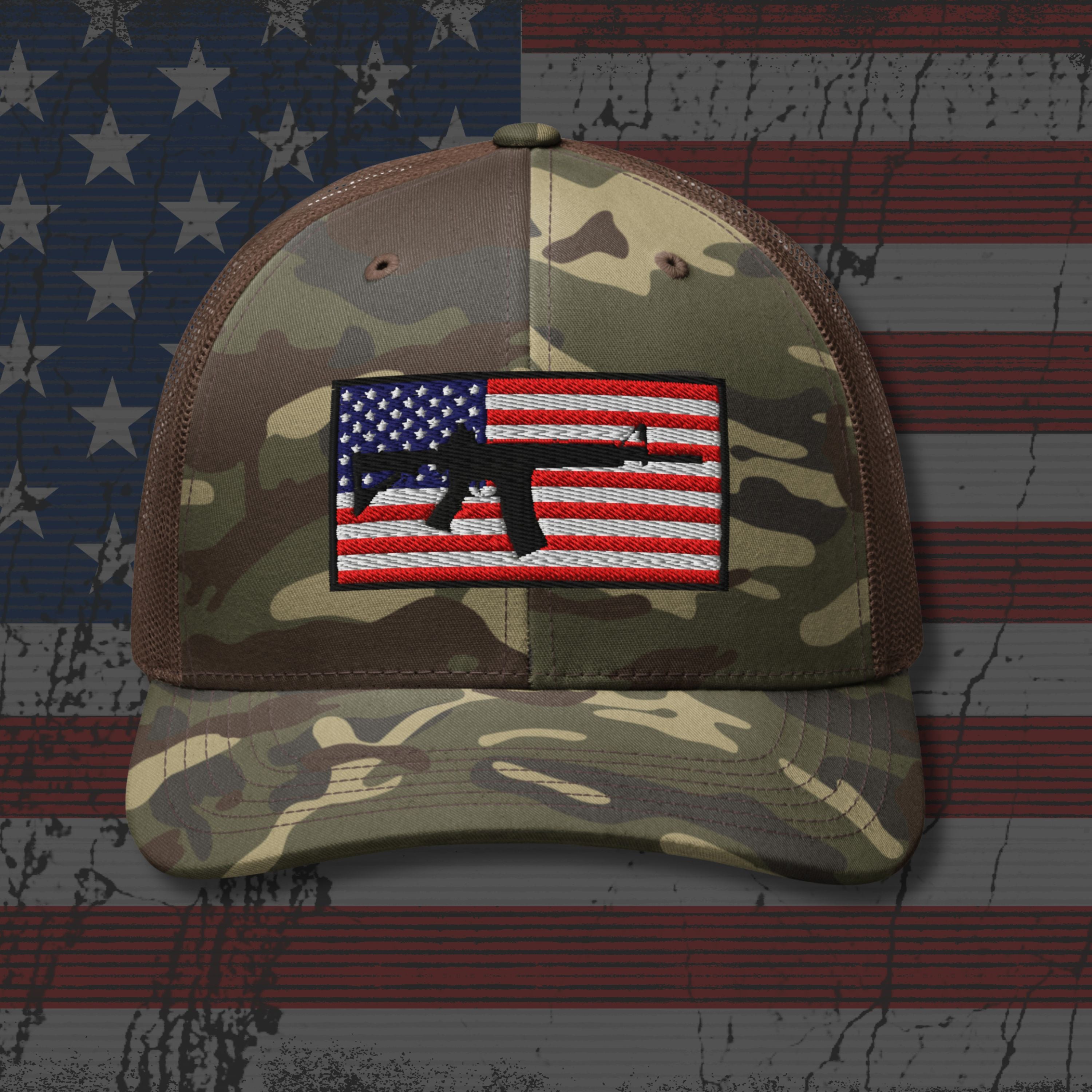 Camouflage baseball cap with American flag patch on an American flag background