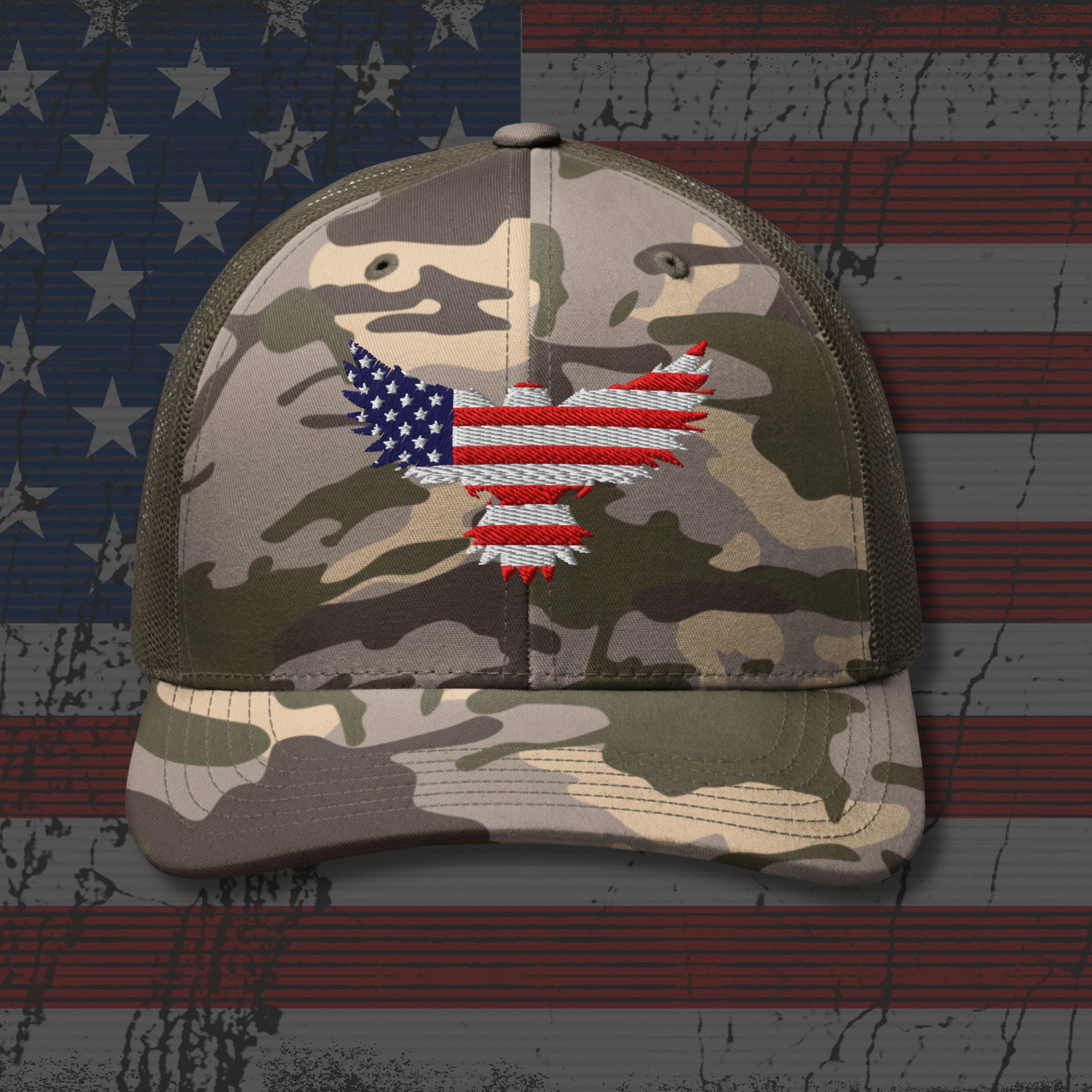 Camouflage cap with American flag design on a distressed American flag background
