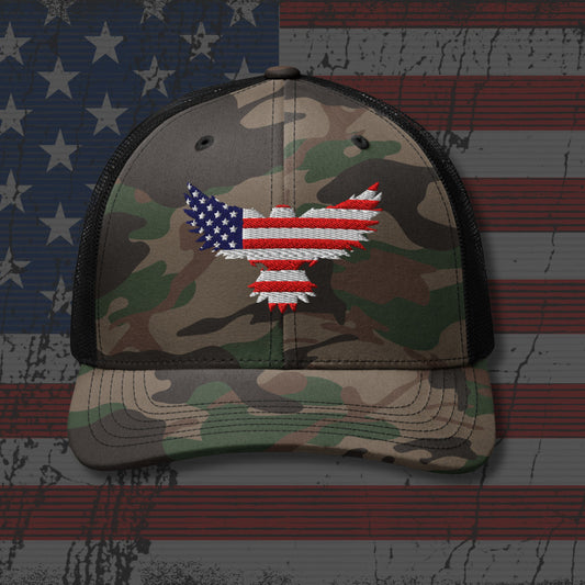 Camouflage cap with American flag design on a distressed American flag background
