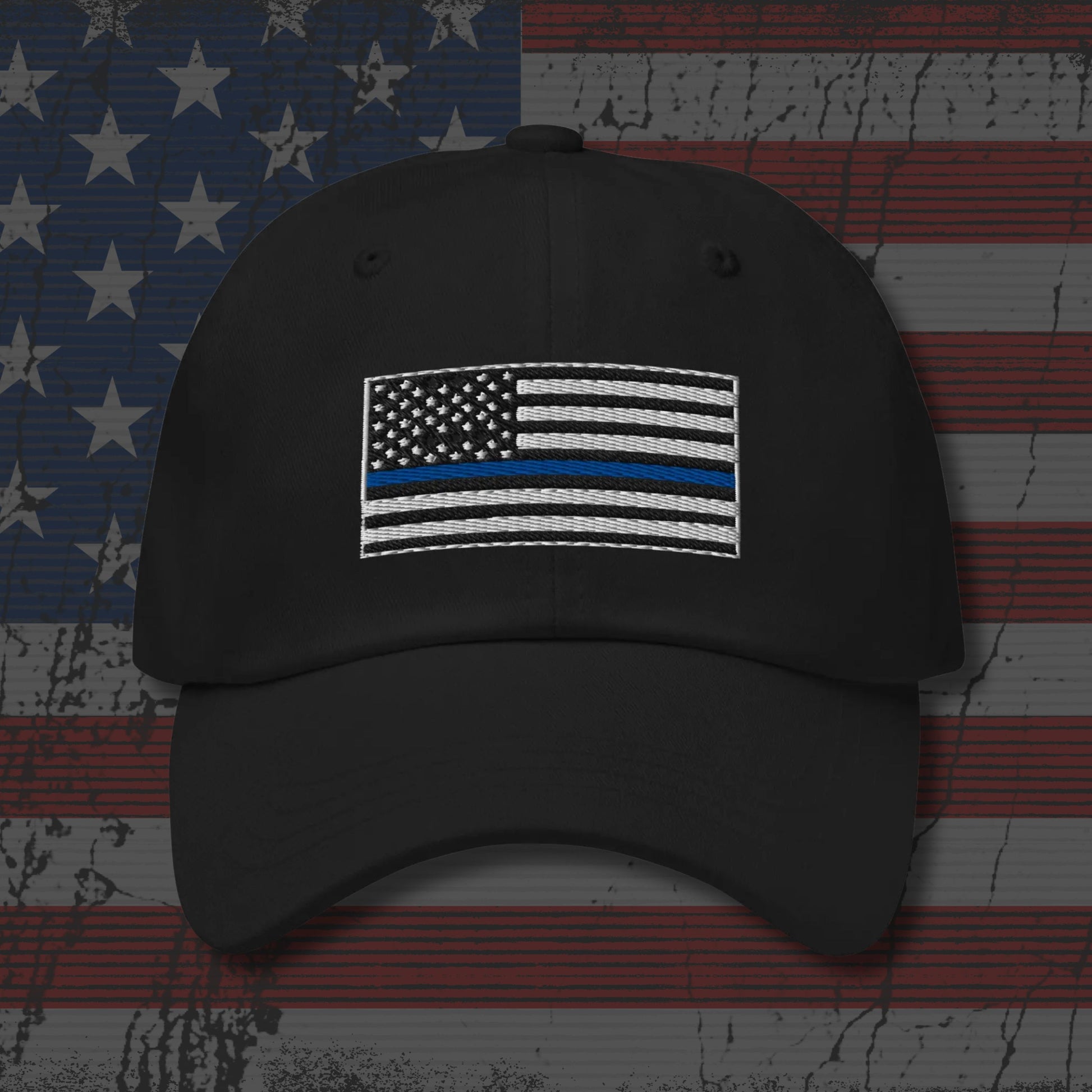 Black cap with American flag patch on a distressed American flag background