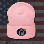 Pink beanie with a bomb-themed patch featuring the letter 'F' on an American flag background.
