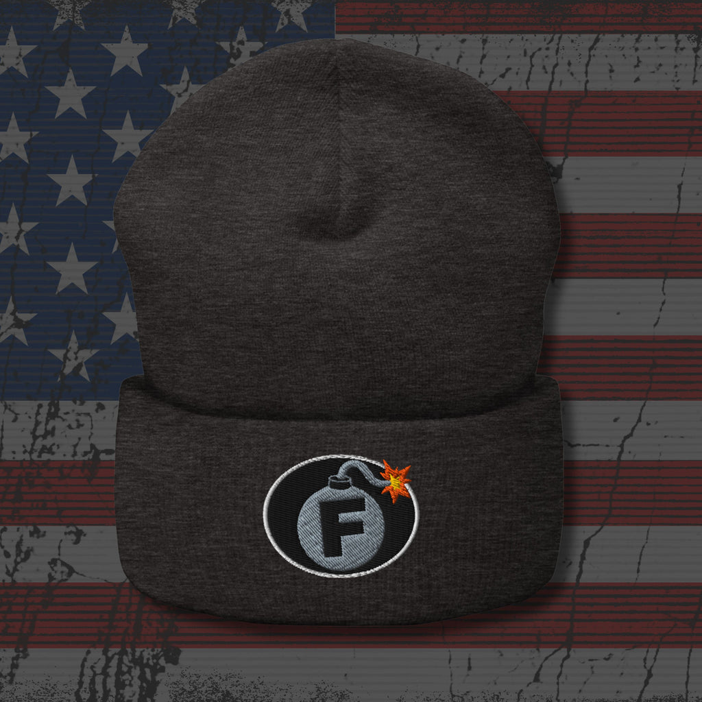 Dark gray beanie with a logo on an American flag background
