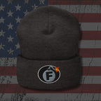 Dark gray beanie with a logo on an American flag background