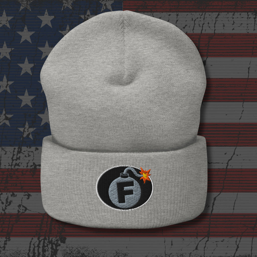 Gray beanie with a bomb-themed logo on an American flag background