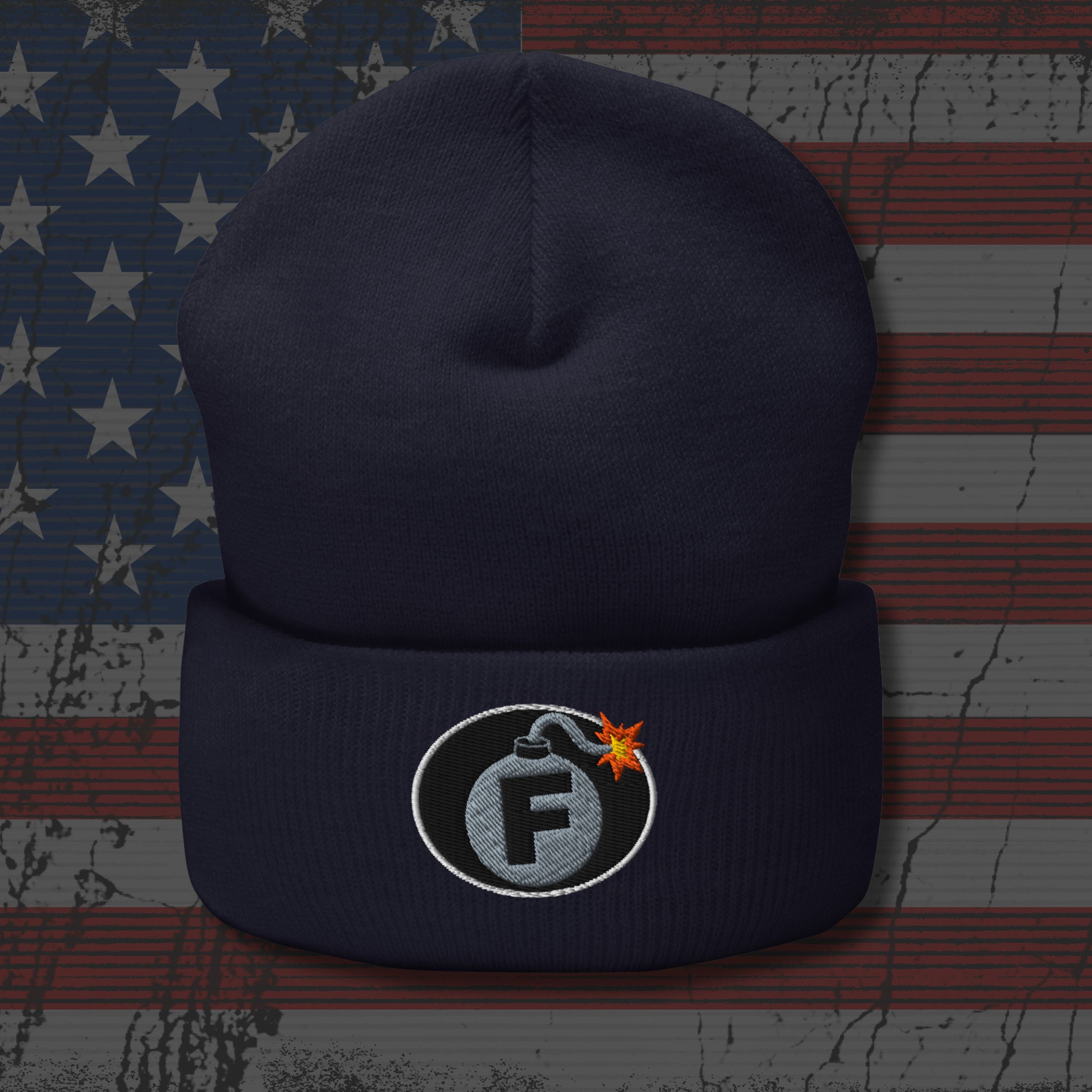 Navy blue beanie with a logo on an American flag background