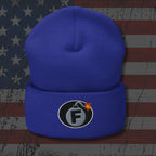 Blue beanie with a bomb-themed logo on an American flag background