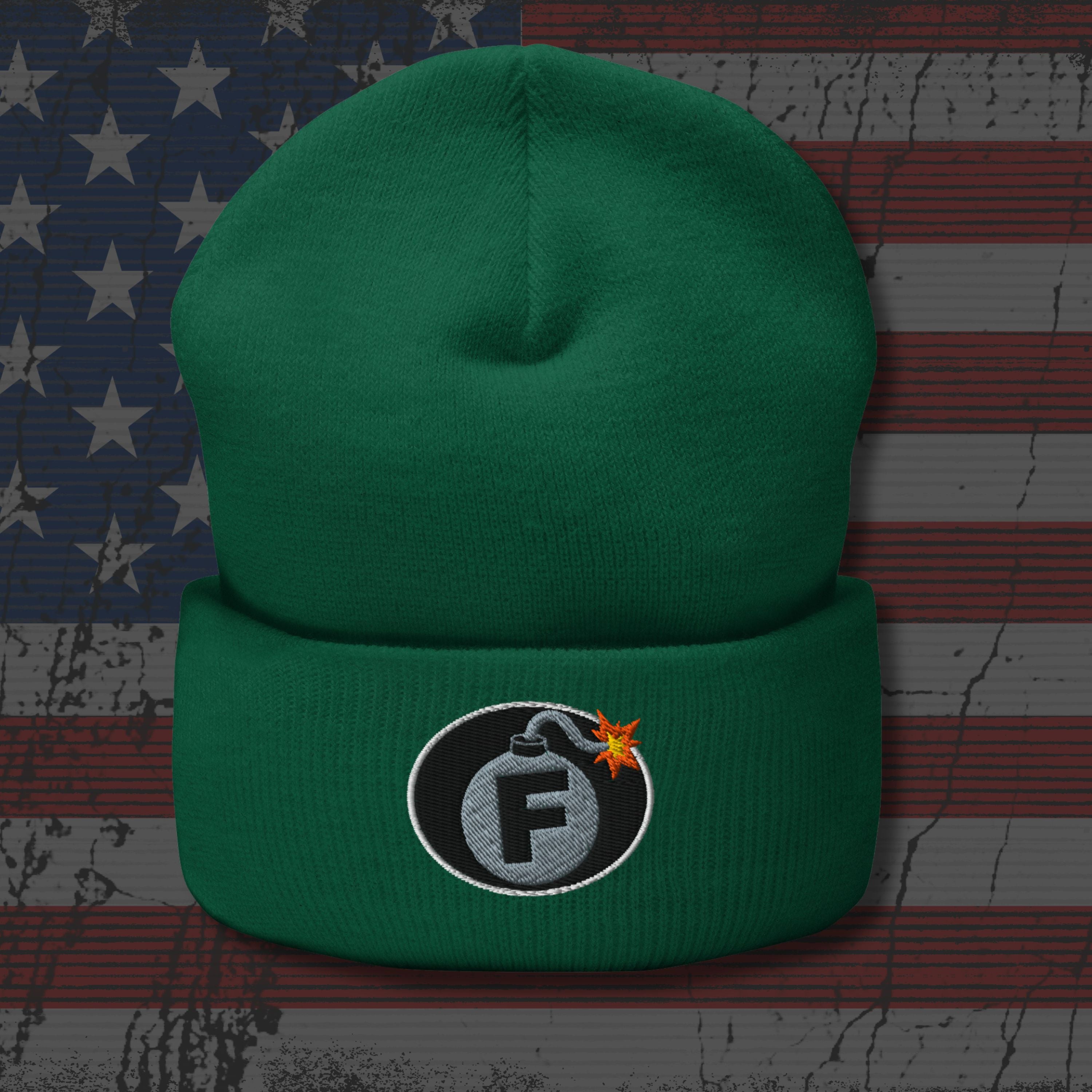 Green beanie with a logo on an American flag background