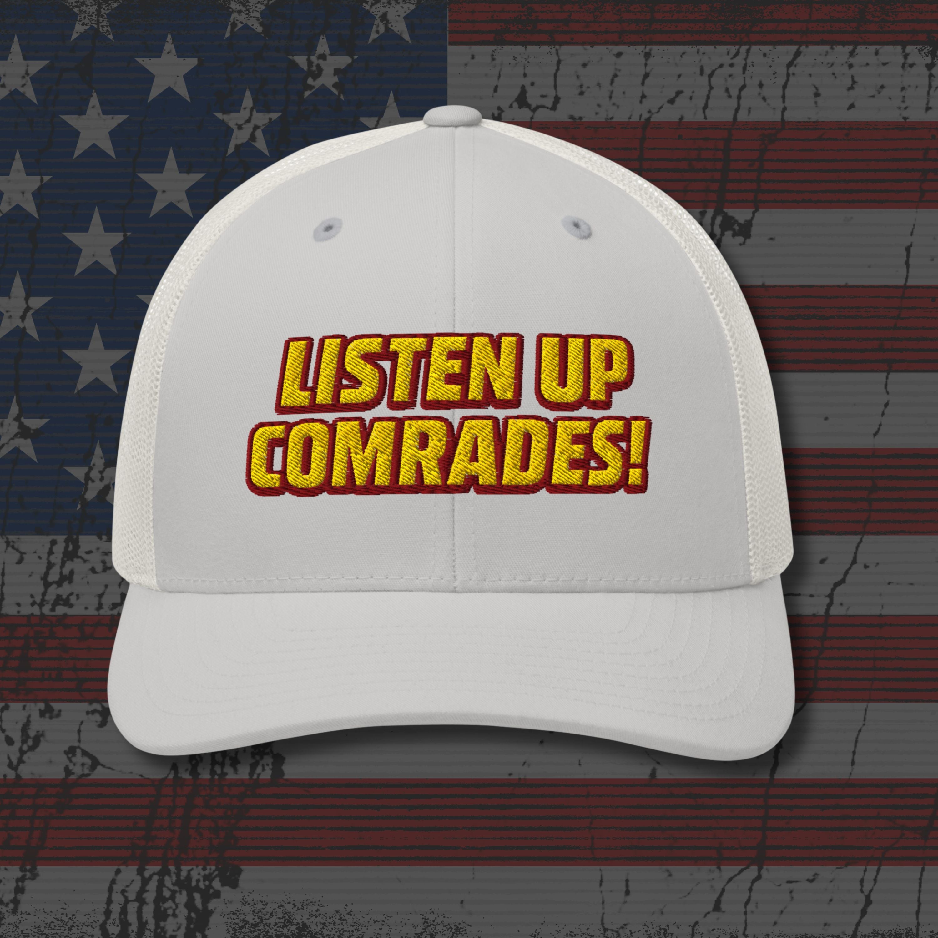 White cap with 'Listen Up Comrades!' text on an American flag background