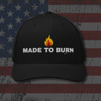Black cap with 'Made to Burn' text and flame graphic on an American flag background