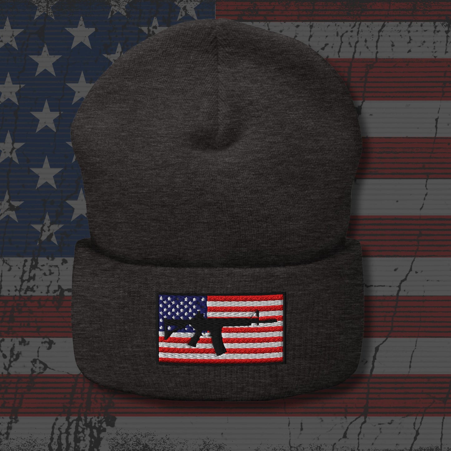 Dark gray beanie with American flag patch on a distressed American flag background