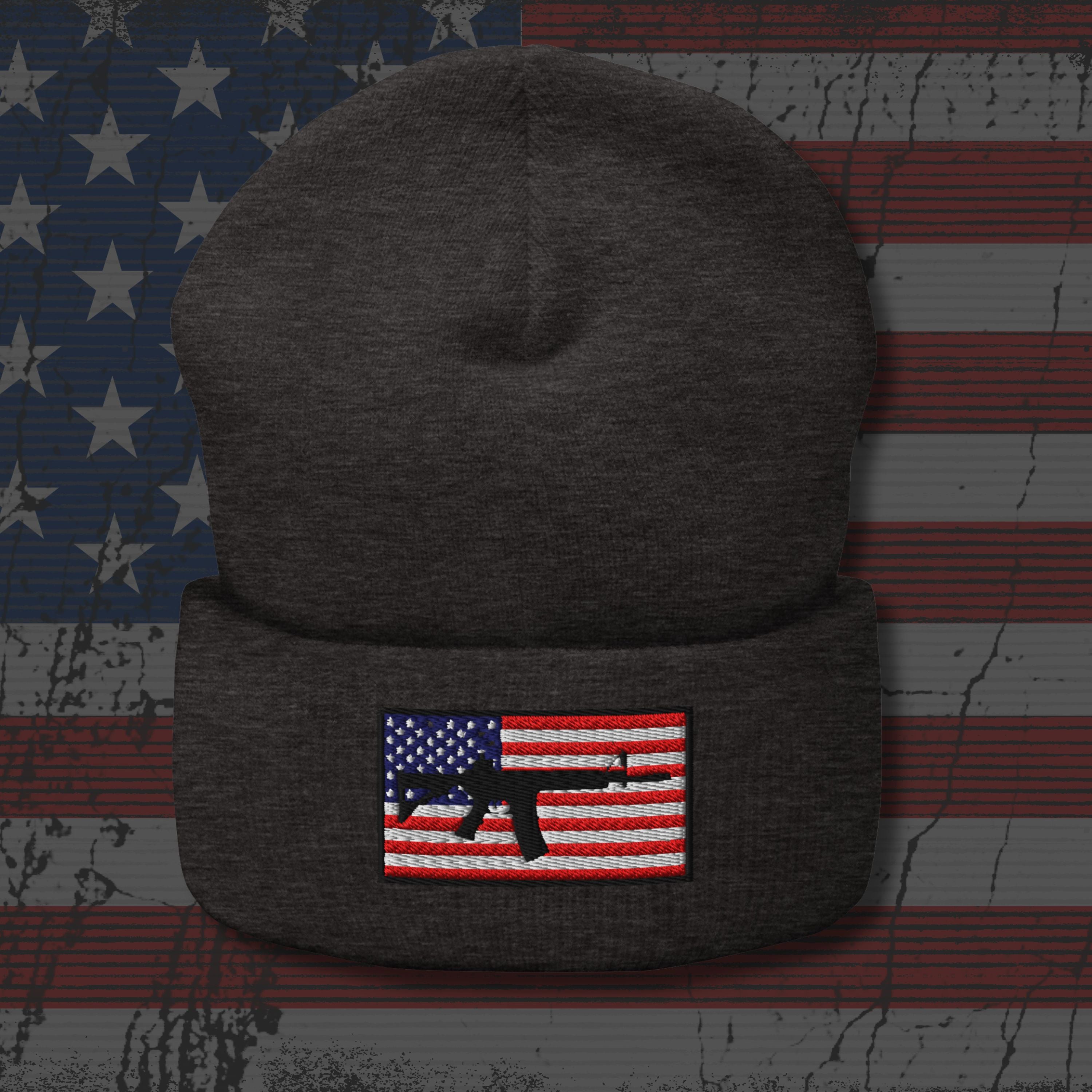 Dark gray beanie with American flag patch on a distressed American flag background