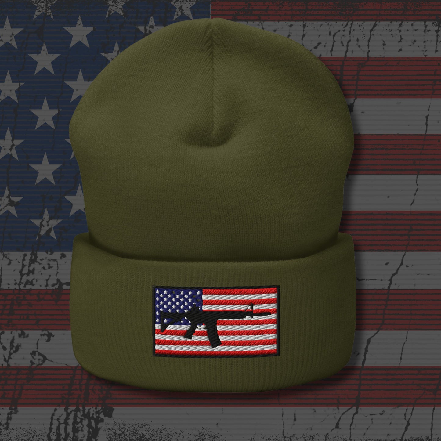 Green beanie with American flag and gun patch on a distressed American flag background