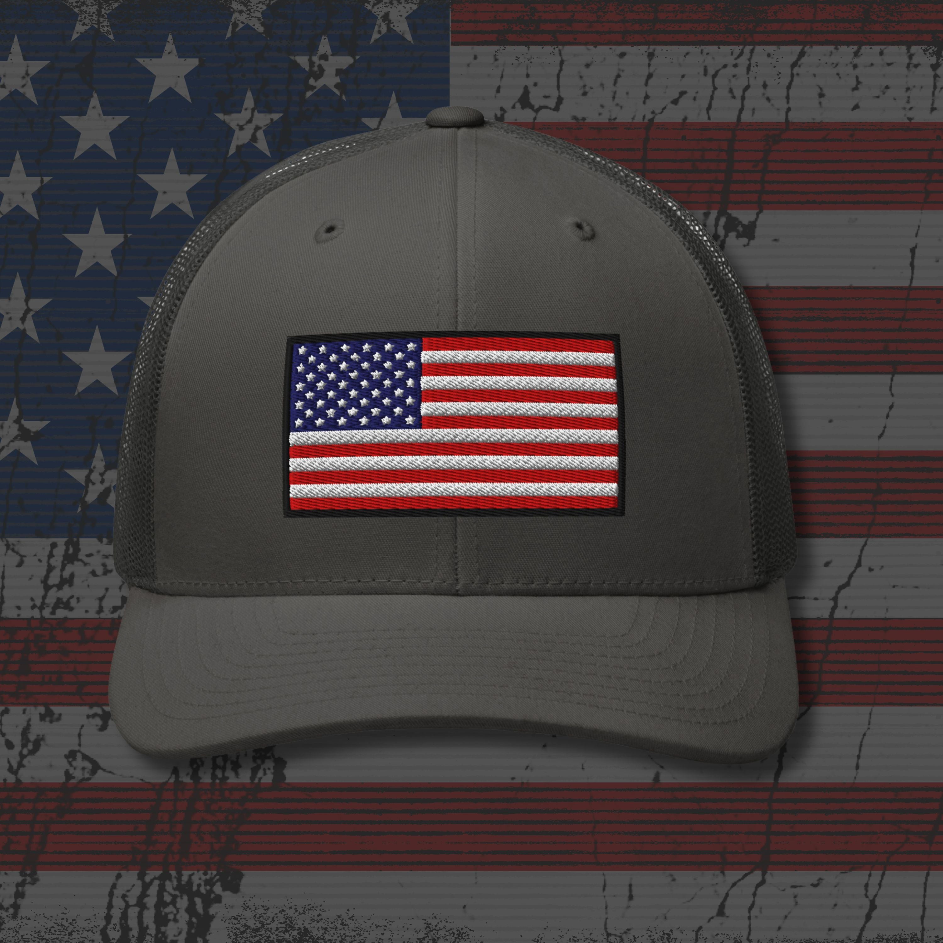 Gray cap with American flag patch on a distressed American flag background