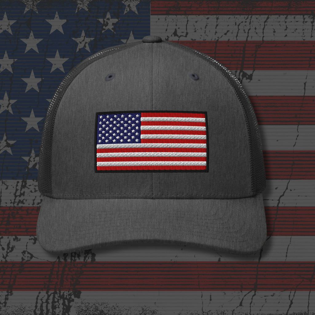 Gray cap with American flag patch on a distressed American flag background