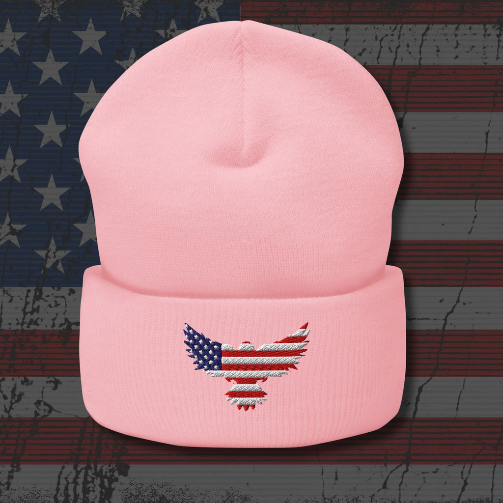Pink beanie with an embroidered eagle design on a distressed American flag background