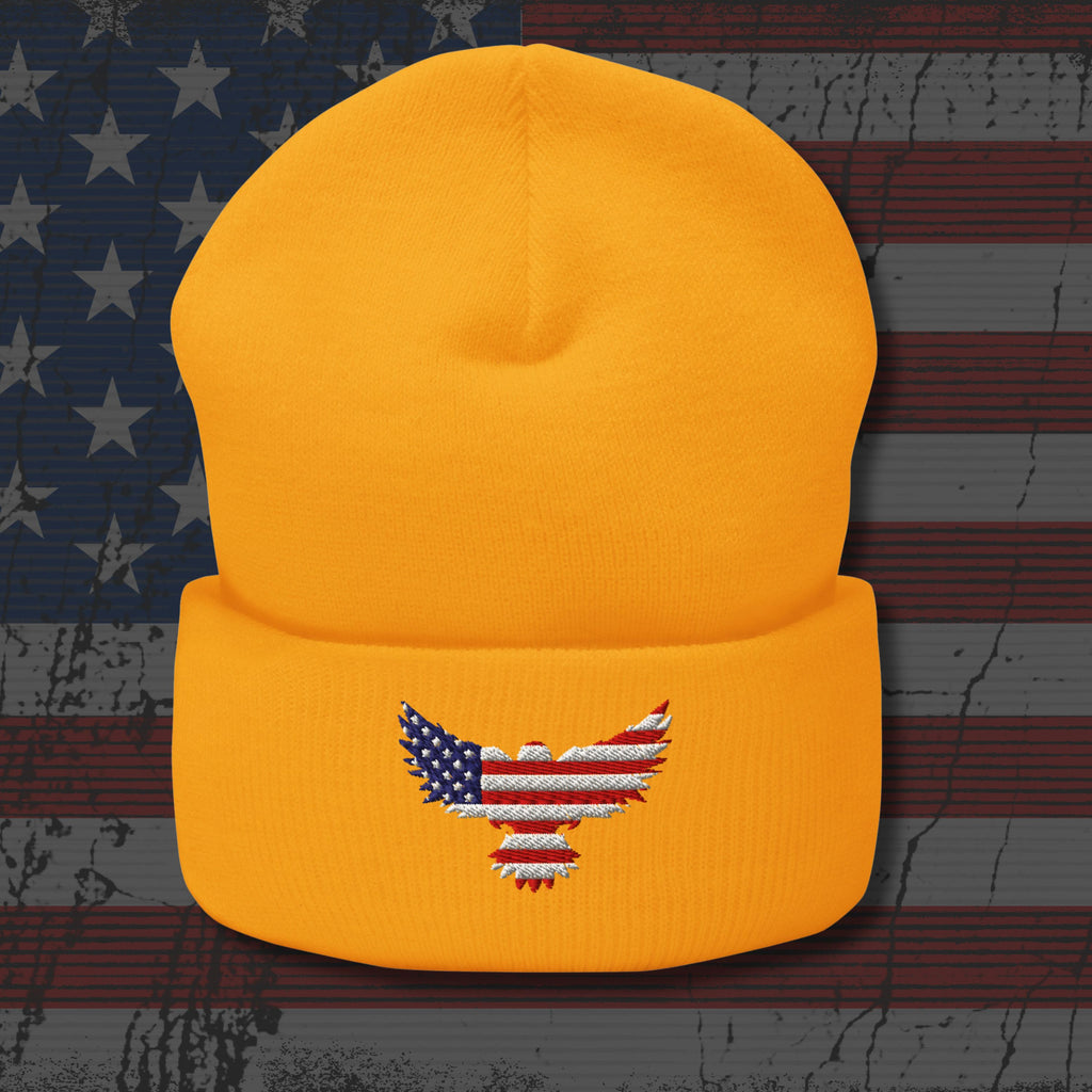 Yellow beanie with an embroidered eagle design on a distressed American flag background