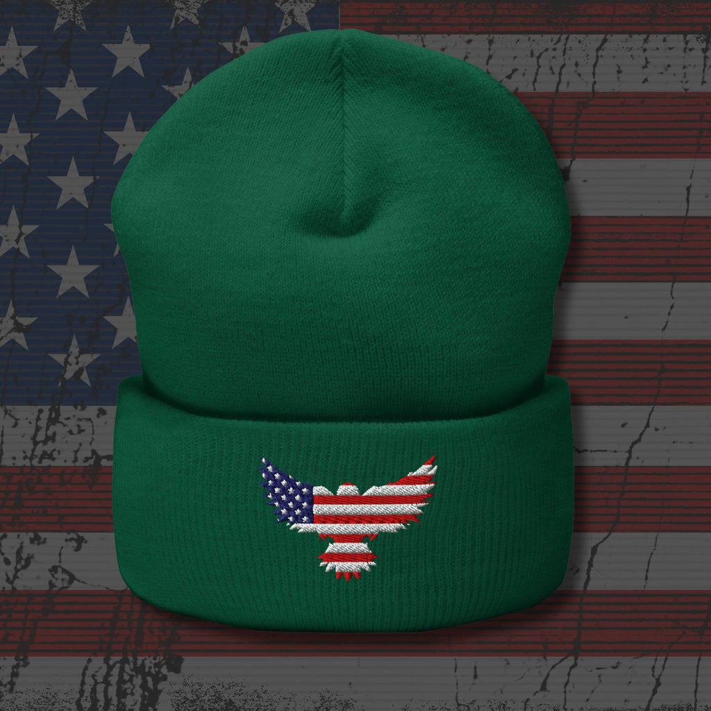 Green beanie with an embroidered eagle design on a distressed American flag background