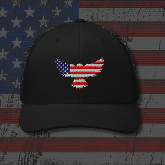 Black cap with American flag eagle design on a distressed American flag background