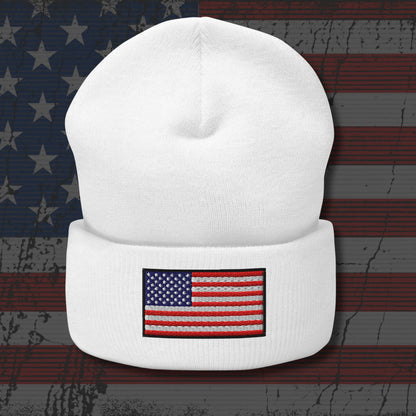 White beanie with American flag patch on a distressed American flag background