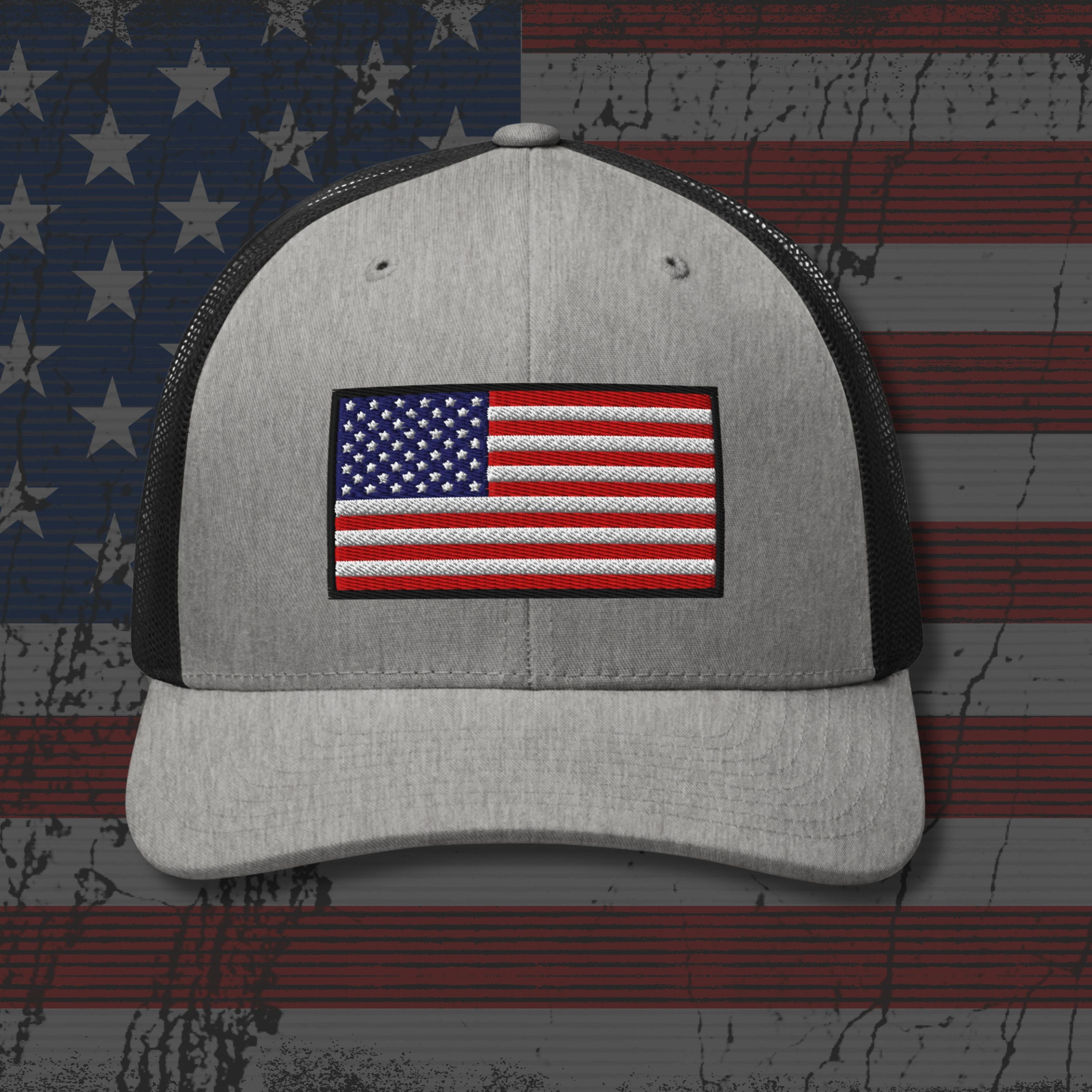 Gray cap with American flag patch on a distressed American flag background