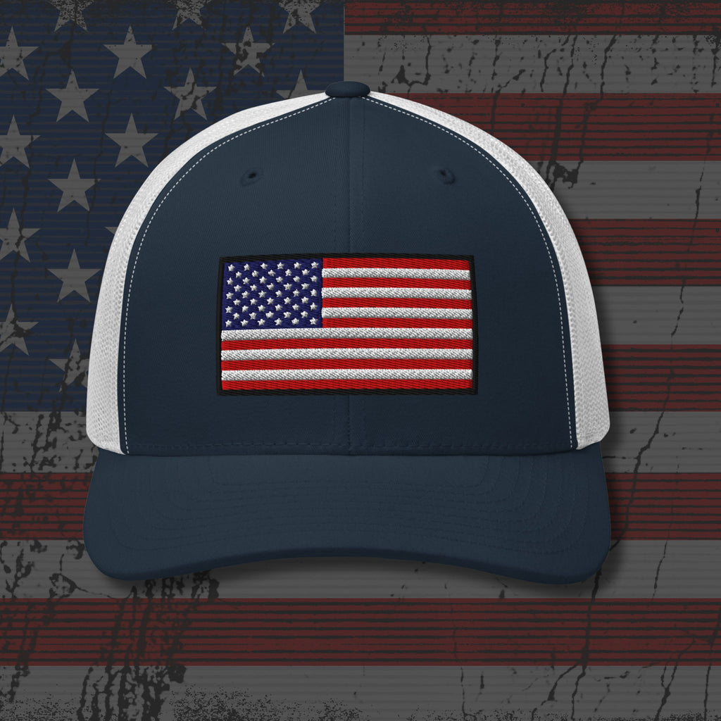 Navy and white cap with American flag patch on a distressed American flag background