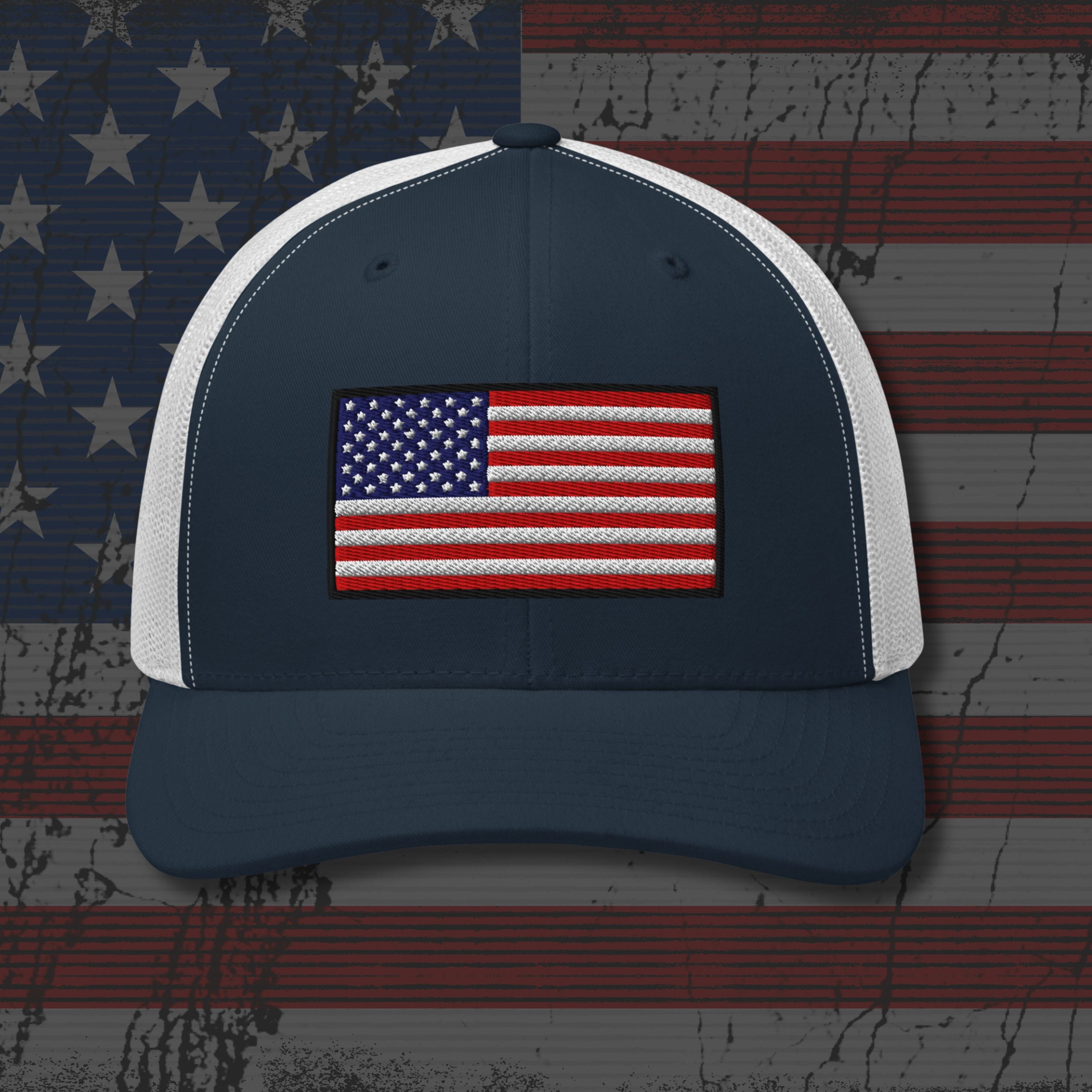 Navy and white cap with American flag patch on a distressed American flag background