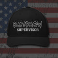 Black snapback hat with embroidered Shitshow Supervisor, back view