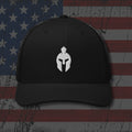 Black snapback hat with embroidered Spartan Helmet, front view