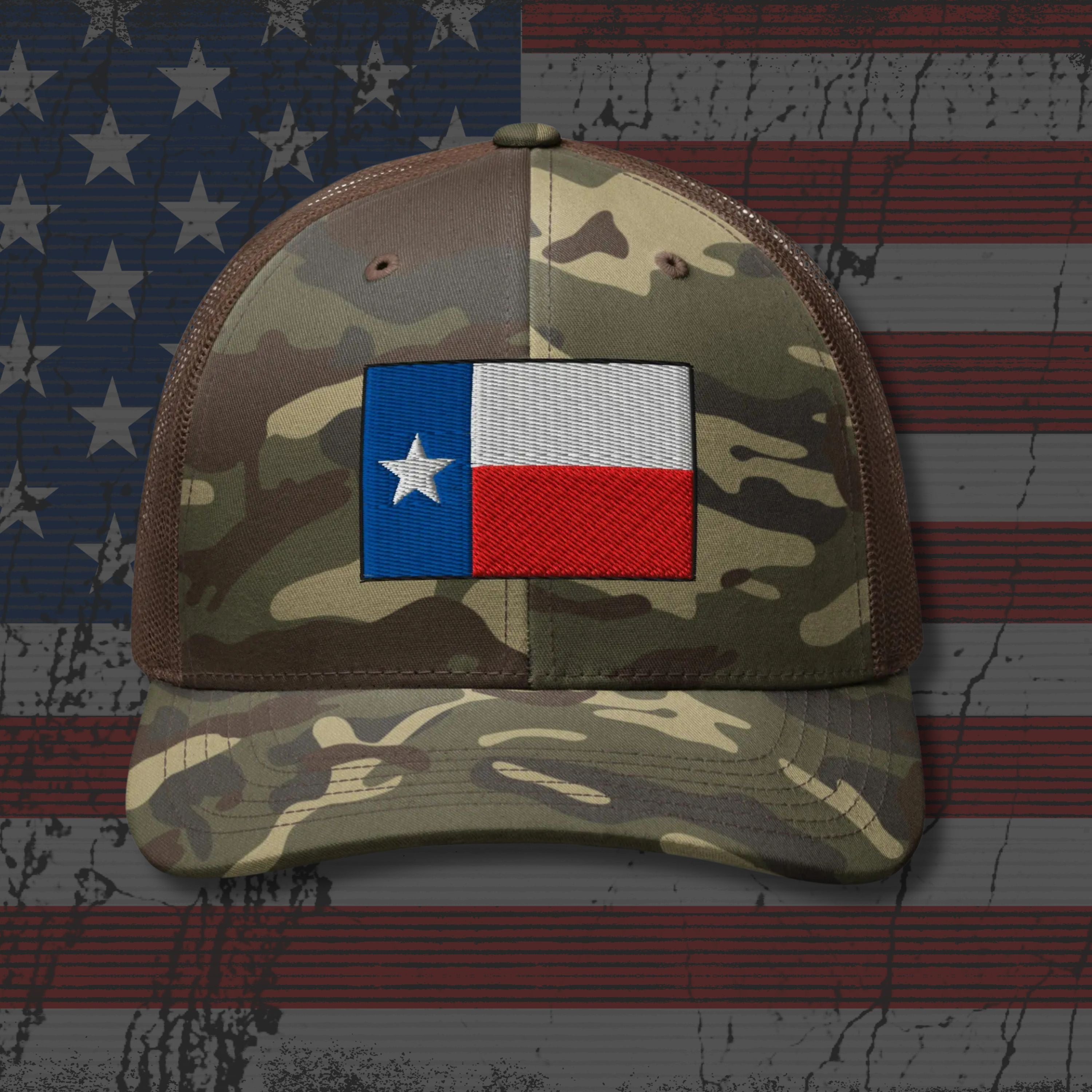 Camouflage cap with Texas flag patch on an American flag background