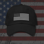 Black cap with American flag design on a distressed American flag background