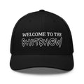 Red snapback hat with embroidered Welcome to the SH!TSHOW, back view