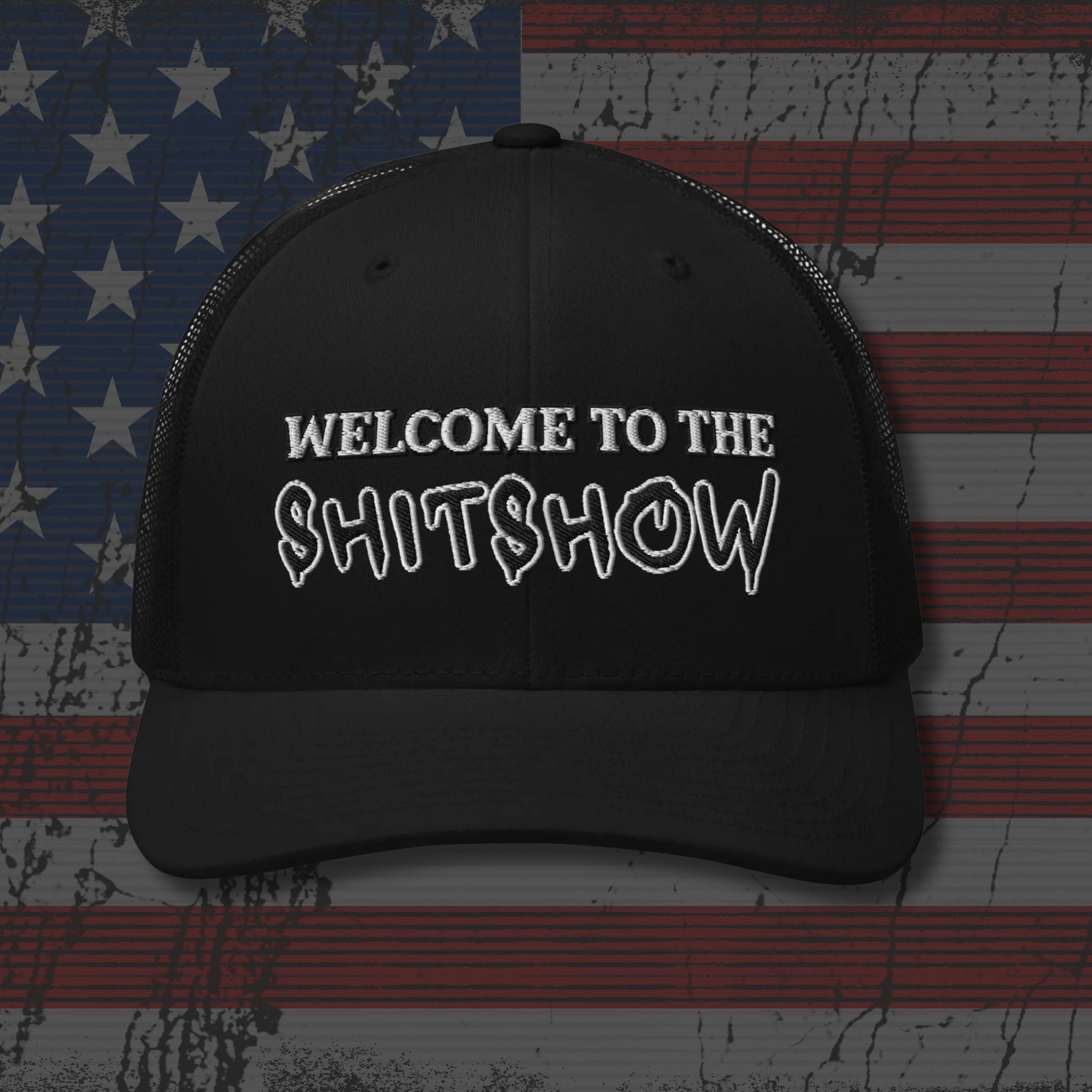 Black cap with 'Welcome to the Shitshow' text on an American flag background