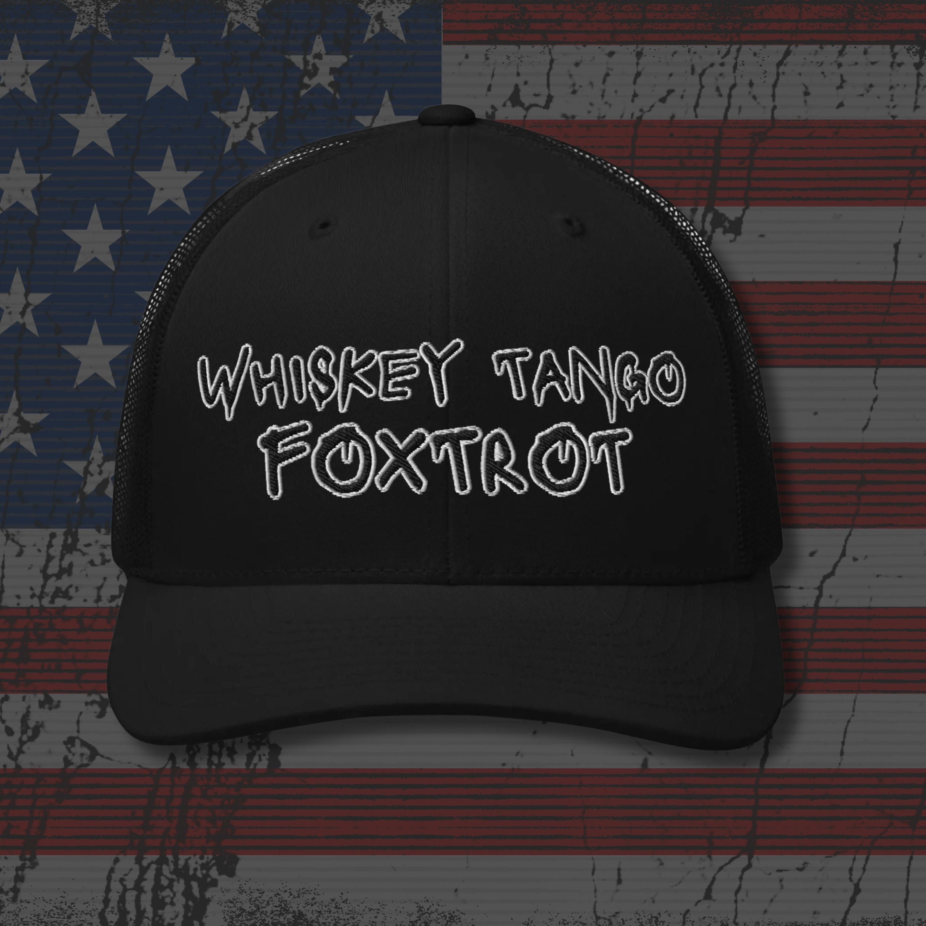 Black cap with 'WHISKEY TANGO FOXTROT' text on an American flag background
