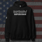 Black hoodie with 'Shitshow Supervisor' text on distressed American flag background