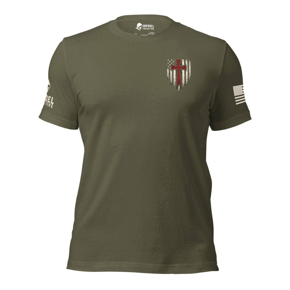 Front view of the Military Green Crimson Cross tee with a small chest graphic, U.S. flag on the left sleeve, and Infidel Collective logo on the right sleeve.