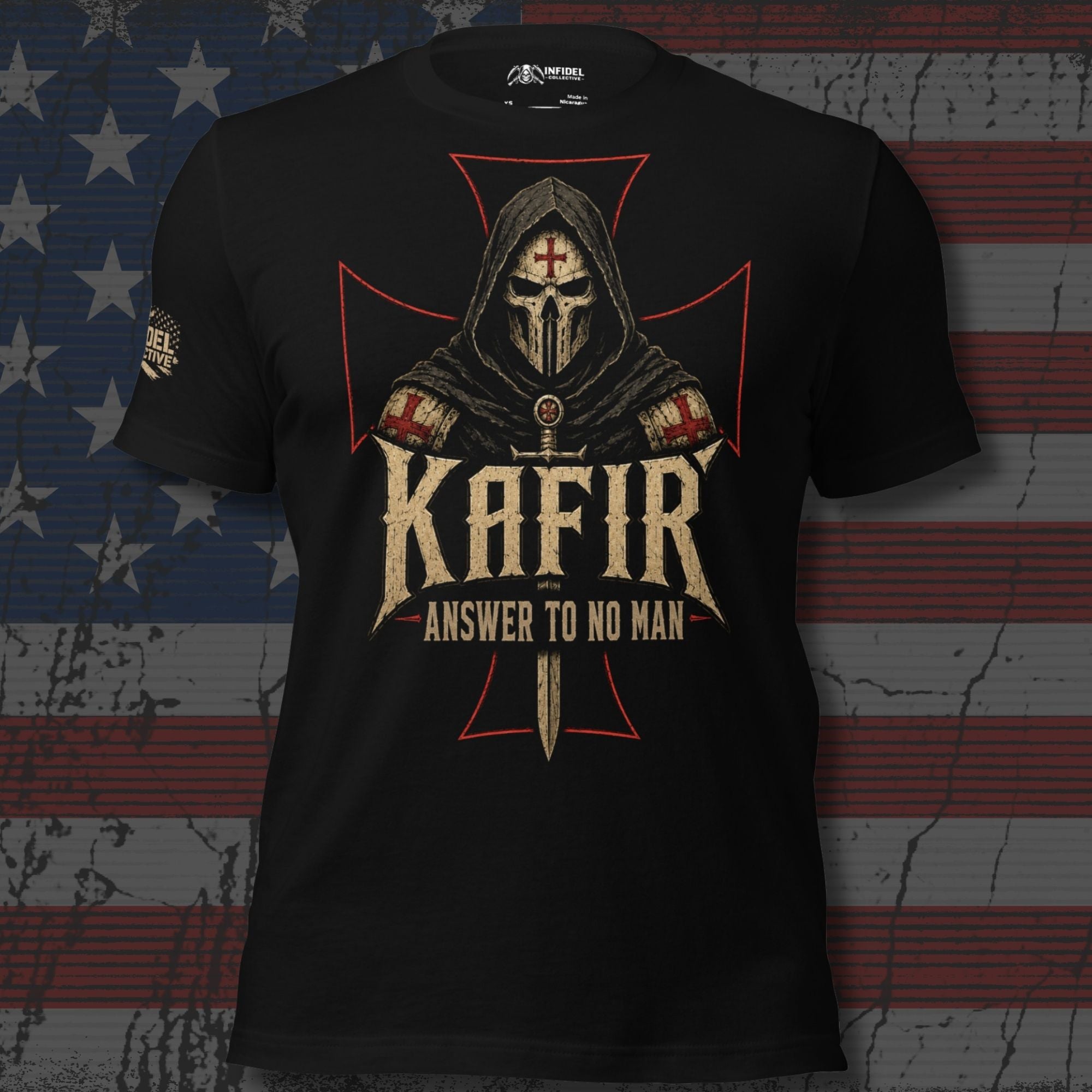 A black short-sleeve graphic T-shirt featuring a hooded Spartan warrior with a red cross on the forehead, a sword, and the text 'KAFIR' and 'ANSWER TO NO MAN' over a red Maltese cross. The shirt is displayed against a distressed American flag background.