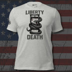 White t-shirt with graphic design and text on an American flag background