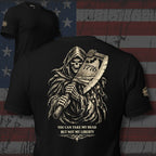 Black t-shirt with a graphic design of a skeleton holding an axe and text 'YOU CAN TAKE MY HEAD BUT NOT MY LIBERTY', against a flag background.