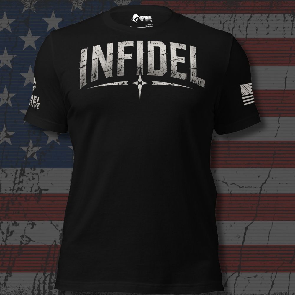 A black short-sleeve t-shirt with a distressed white graphic on the chest reading 'INFIDEL' and a compass motif, plus a small American flag print on the sleeve. The shirt is displayed against a distressed American flag background.