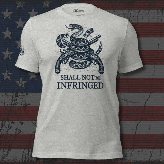 White t-shirt with snake and sword design and 'Shall Not Be Infringed' text on an American flag background.