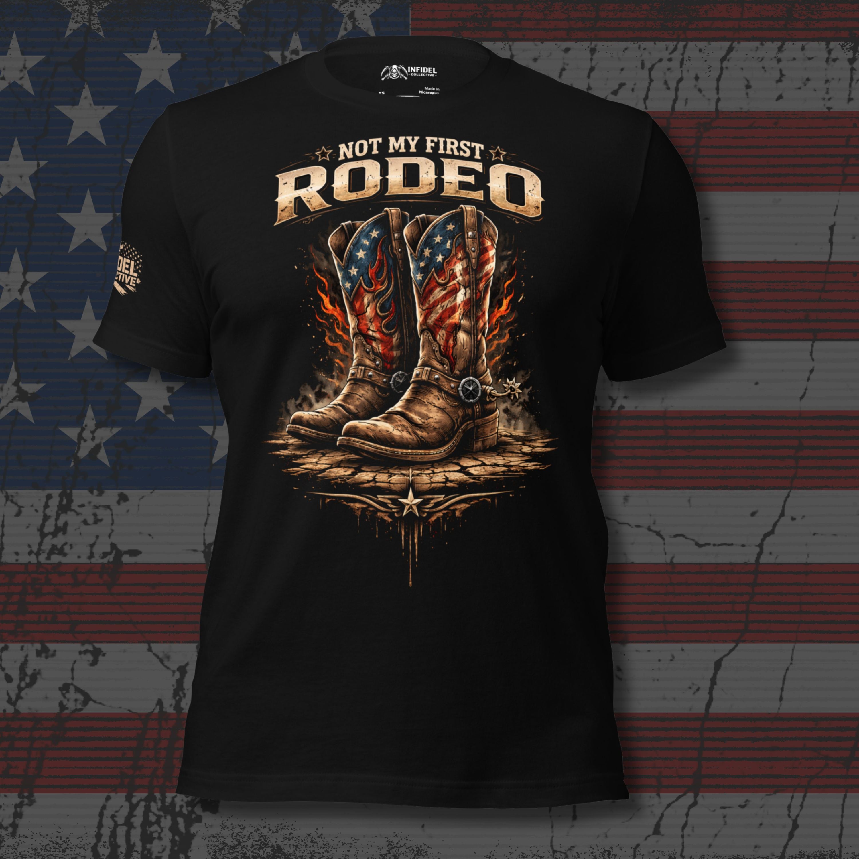 Black front print t-shirt featuring patriotic cowboy boots with flames and Not My First Rodeo western graphic