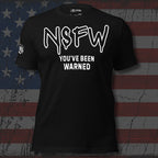 Black tee with NSFW You've Been Warned graphic in white graffiti-style lettering