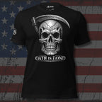 Black tee with Oath Is Bond front print featuring a skull with a reaper scythe above and distressed white artwork