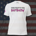 White t-shirt with 'WELCOME TO THE SHITSHOW' text on a distressed American flag background