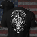 Play the Hand You're Dealt skeleton hand and playing cards back print black tee from Infidel Collective
