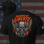 Powered by Liberty engine back print black tee from Infidel Collective