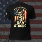 Black front print t-shirt featuring a patriotic woman wearing American flag sunglasses with the phrase Proud To Be An American USA Strong