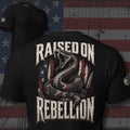Raised on Rebellion American flag rattlesnake back print black tee from Infidel Collective