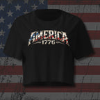 Black t-shirt with 'AMERICA 1776' design on a distressed American flag background